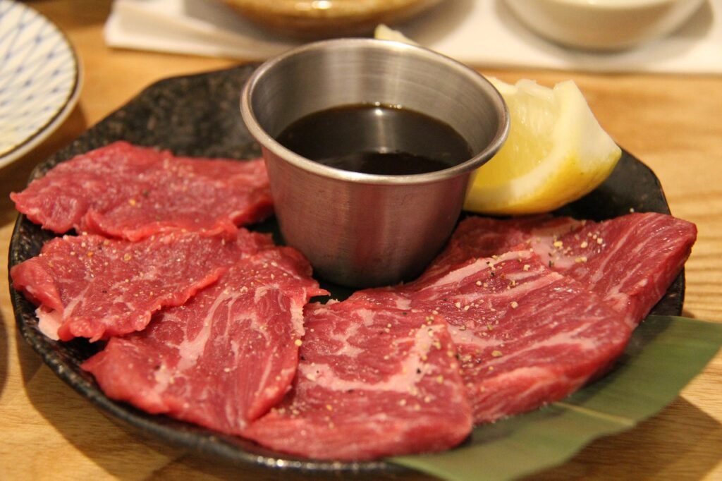 Wagyu yakiniku.. Slices of meat with a bowl of sauce. 9 best things to do in akihabara.